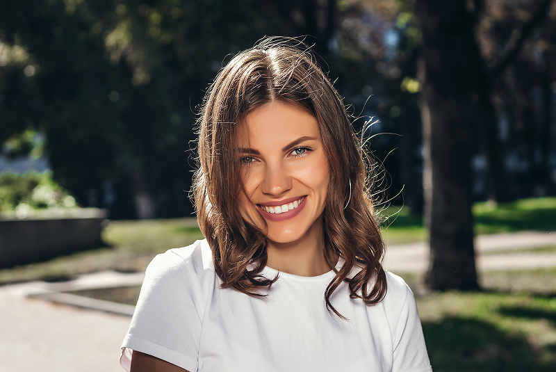 beautiful woman smiling outside