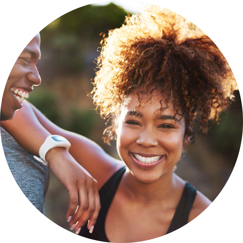 couple smiling in the sun