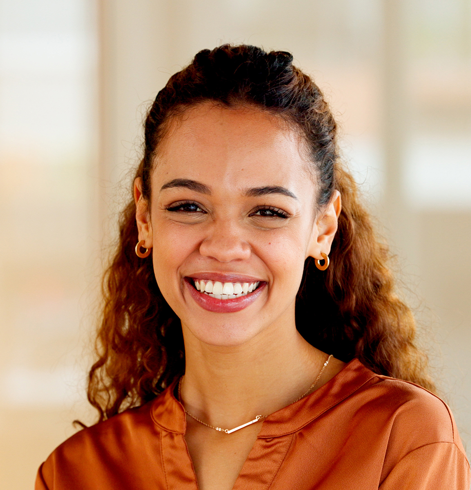 Smiling woman representing professional teeth whitening results