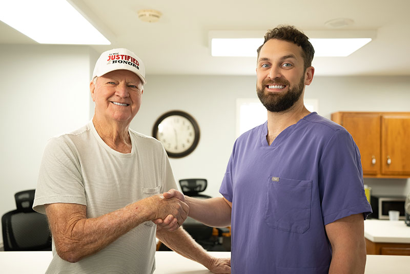 dr with man in hat