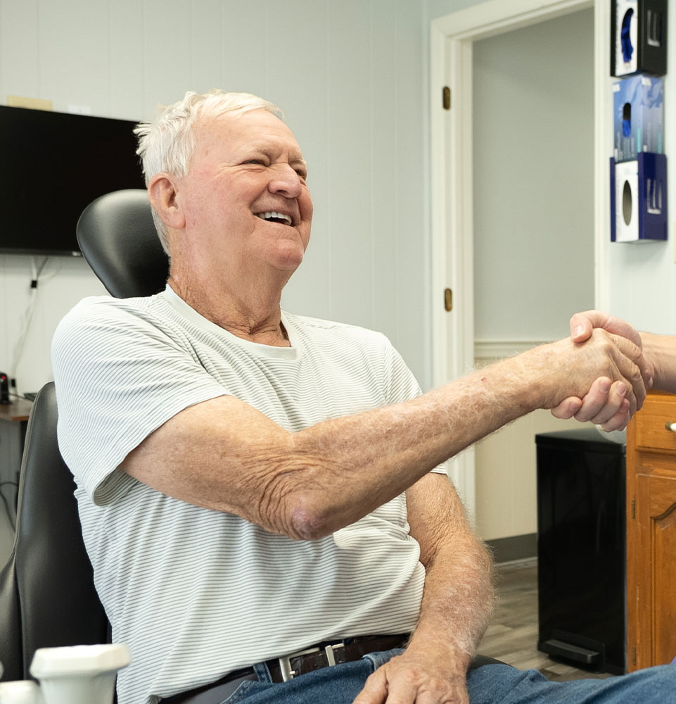 Patient after dental crown treatment